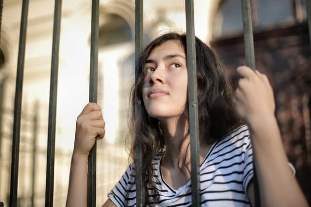 sad-isolated-young-woman-looking-away