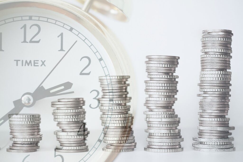 immagine di soldi e orologio